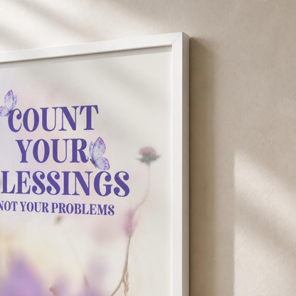 White-framed Count Your Blessings gratitude poster shown in a styled home interior