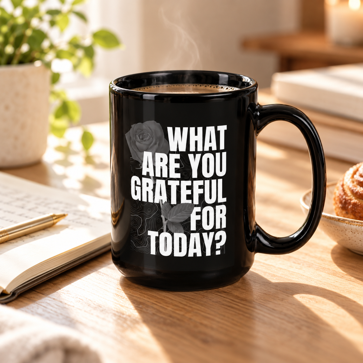 Black What Are You Grateful For Today mug on a sunlit kitchen counter with a croissant