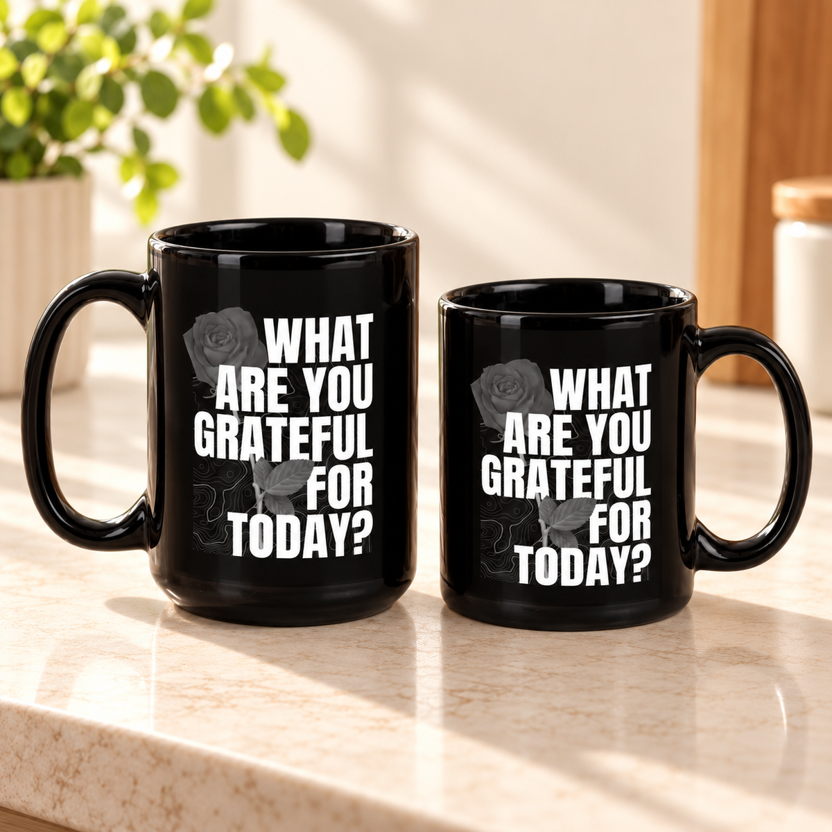 What Are You Grateful For Today glossy black ceramic mug showing the white floral typography design